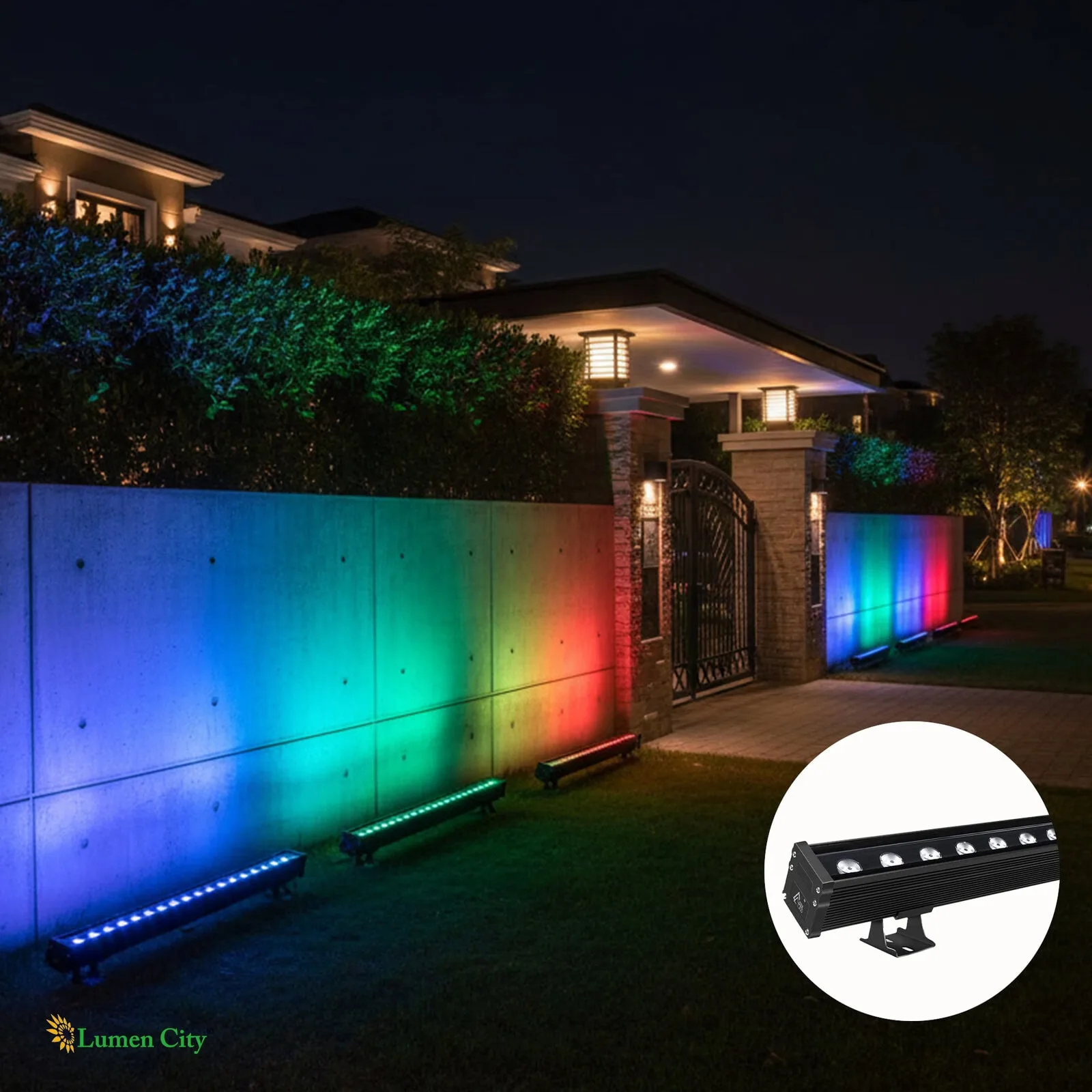Colorful LED outdoor lighting illuminating a modern residential boundary wall at night.