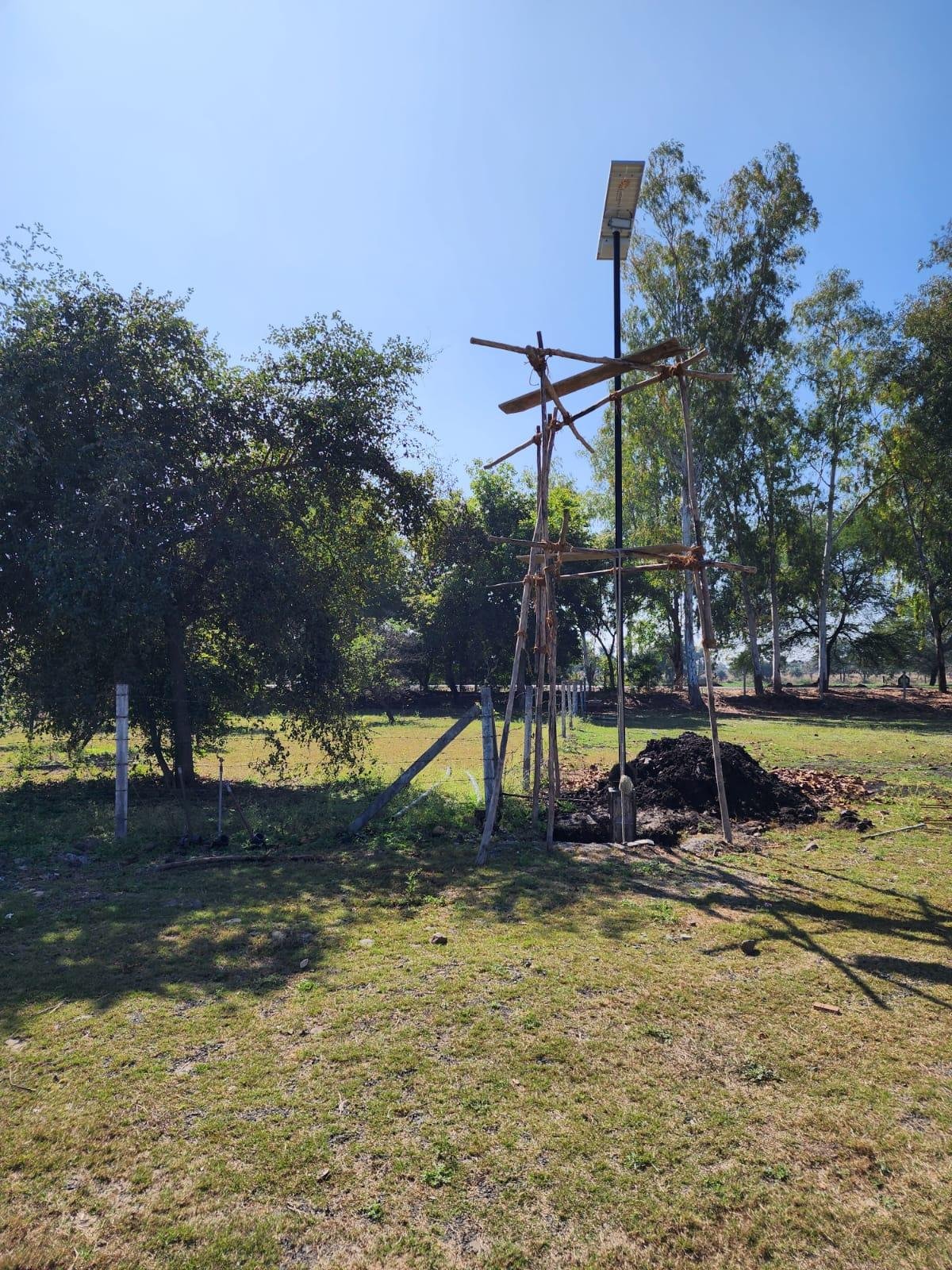 High brightness solar street light installed outside farmhouse providing wide outdoor lighting coverage