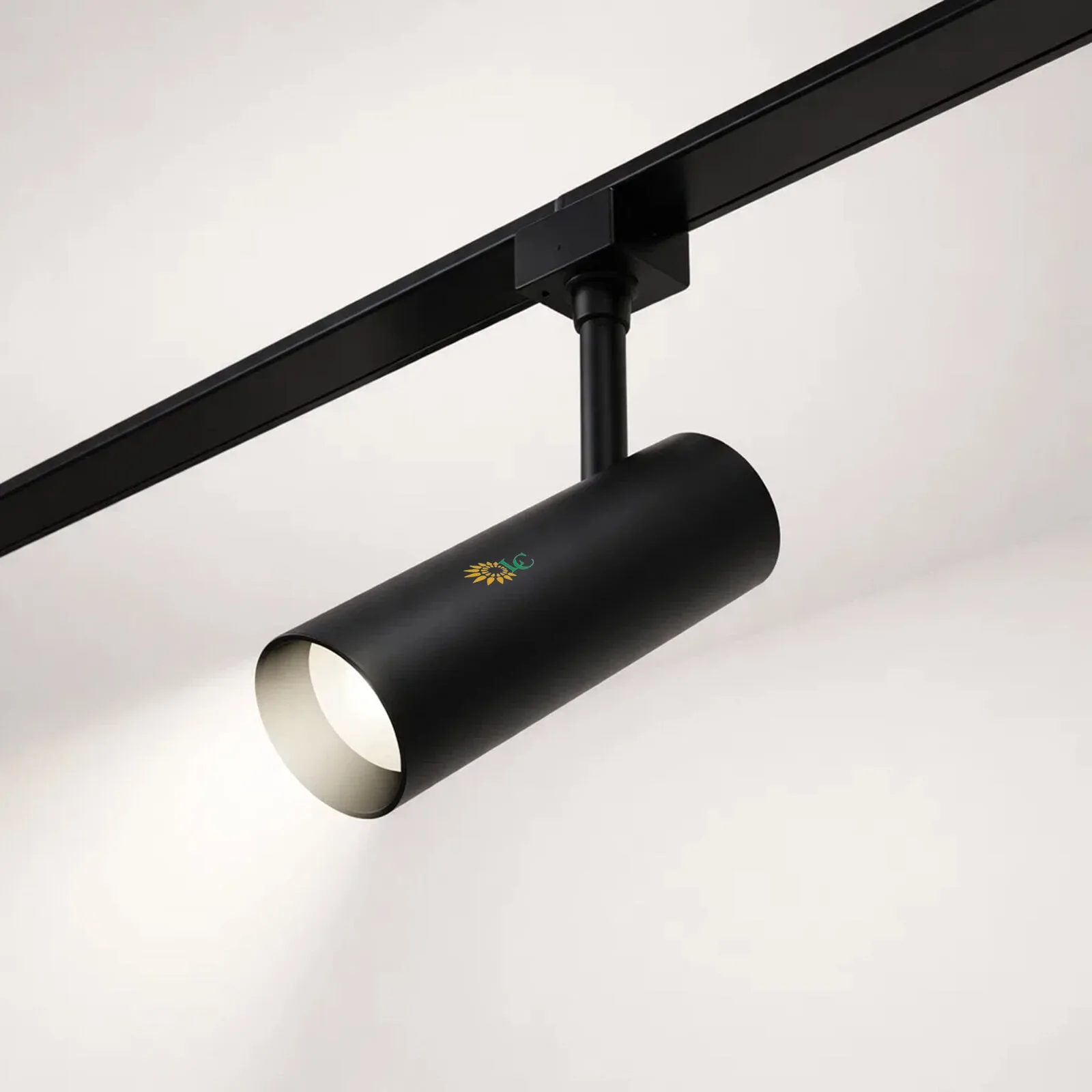 Adjustable black LED track light with colorful logo, modern design, suitable for contemporary interi.