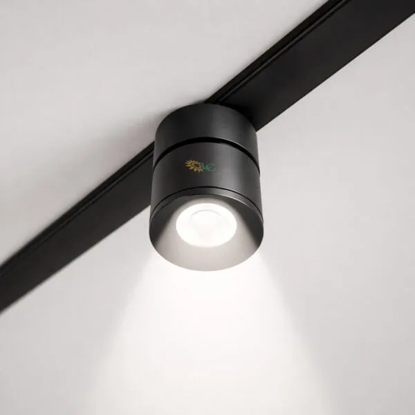 LED ceiling spotlight for modern lighting design, installed on a white ceiling with black track.