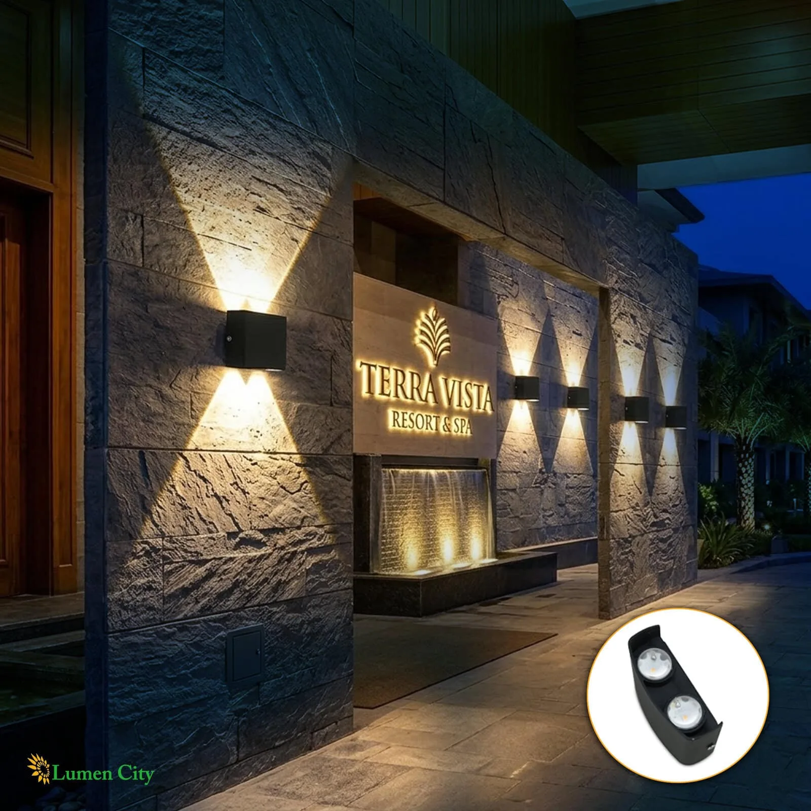 Exterior view of Terra Vista Resort & Spa illuminated at night with lighting fixtures.