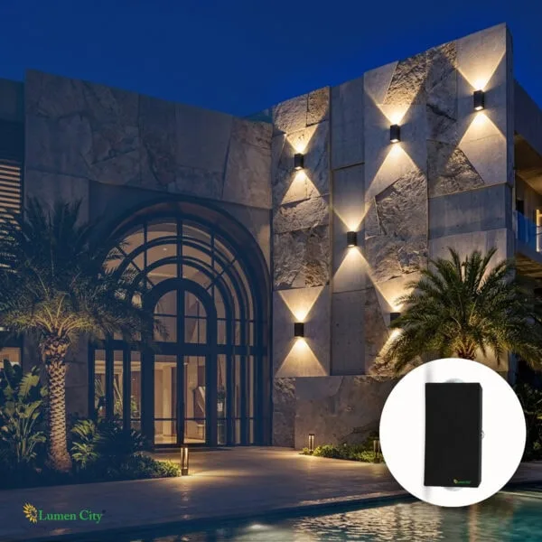 Luxurious modern hotel exterior with stylish lighting and lush palm trees at night.